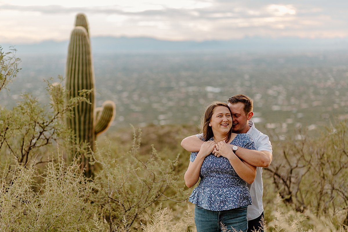  man hugs woman from behind at  Mount Lemmon session 