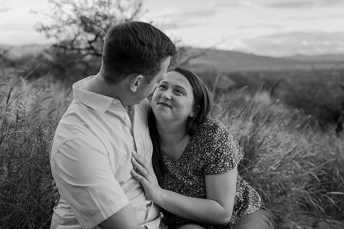  fiances lean on each other for Arizona engagement photographer 