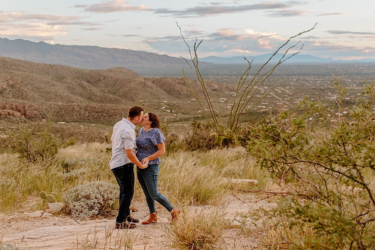  couple kisses in desert at  Mount Lemmon session 