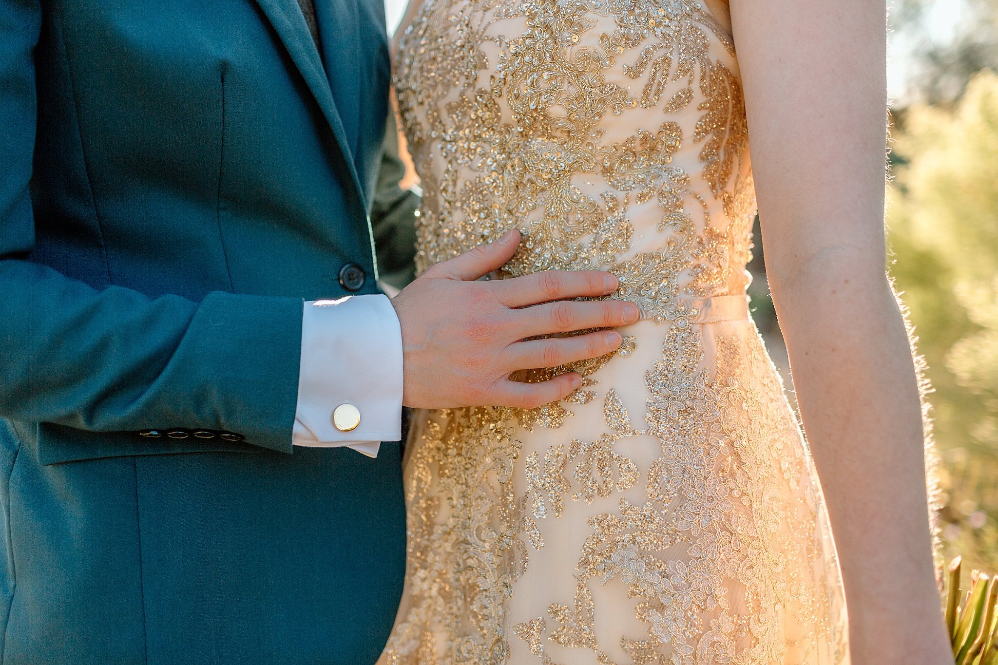  partner holds bride’s waist by Lucy B Photography 