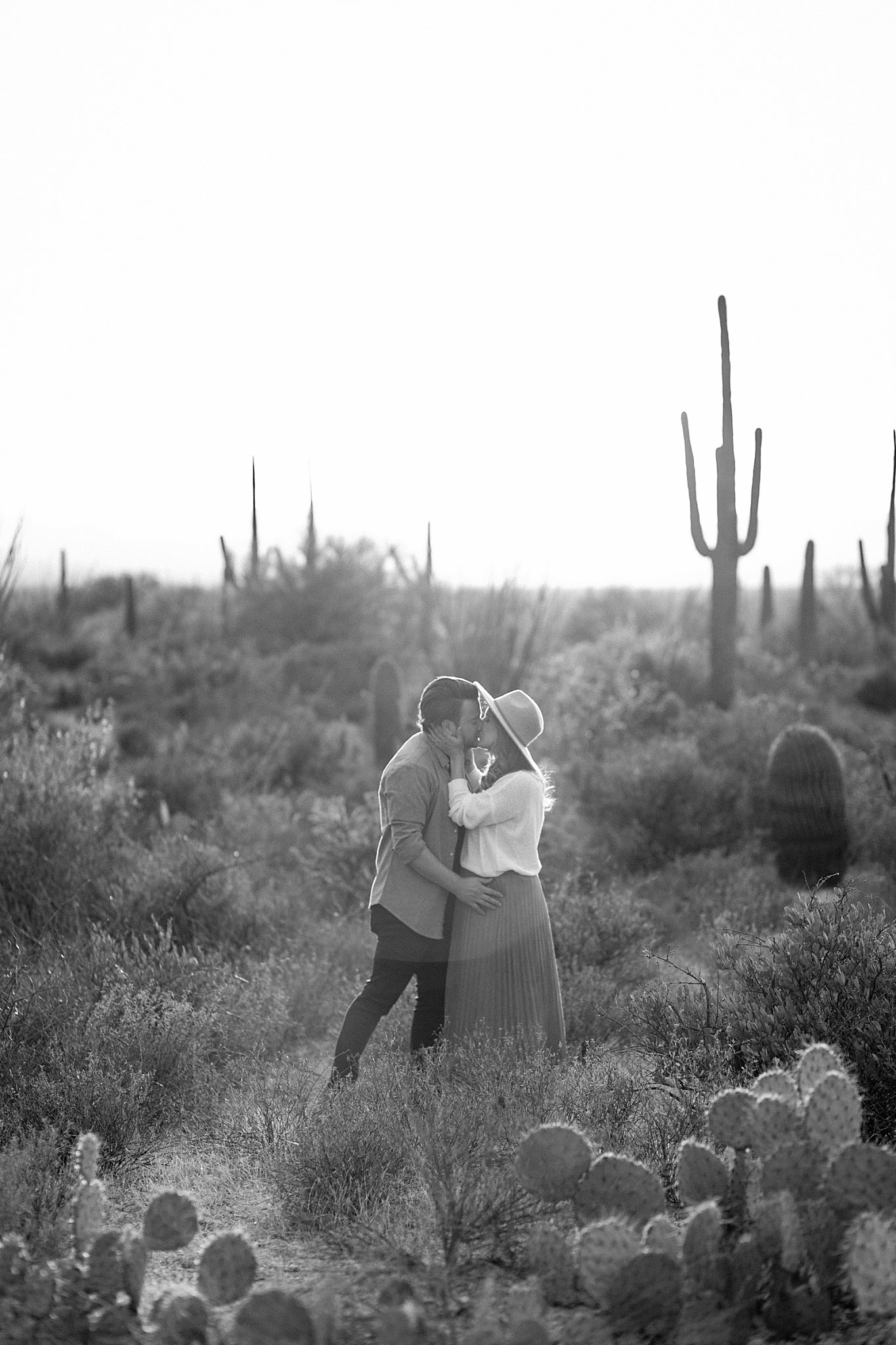  couple kisses in desert by Arizona Couples Photographer 