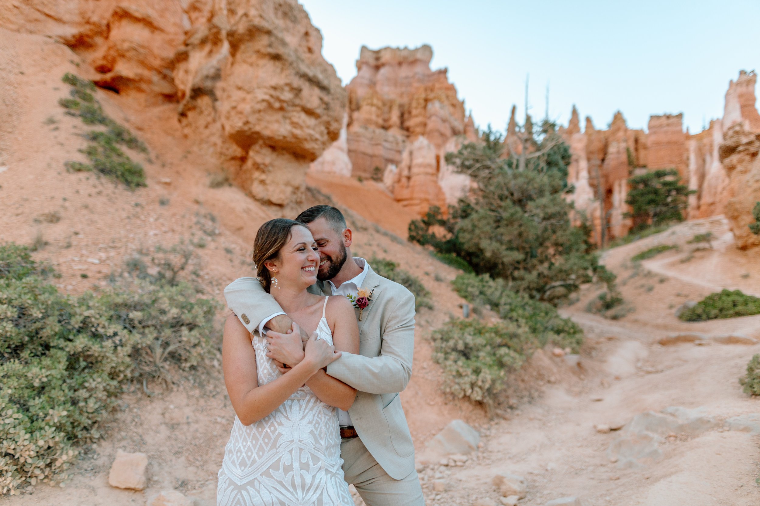  couple holds each other at bryce canyon elopement 