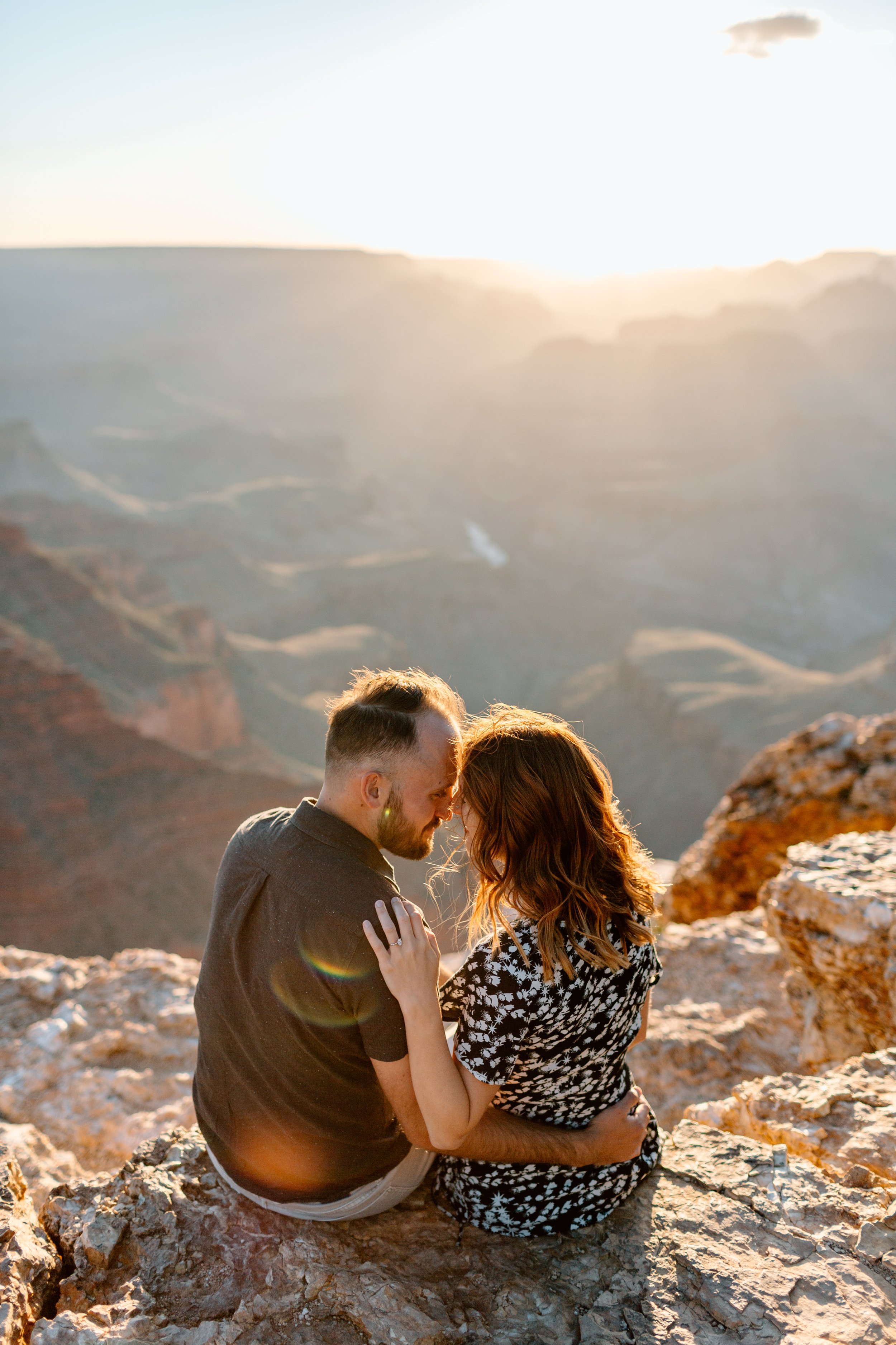  couple touches foreheads together during their grand canyon couples session 