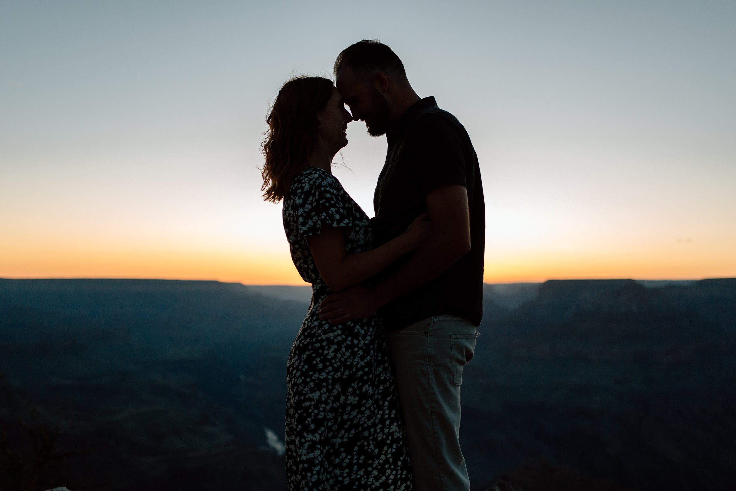  silhouette of a couple after sunset for their grand canyon photography session 