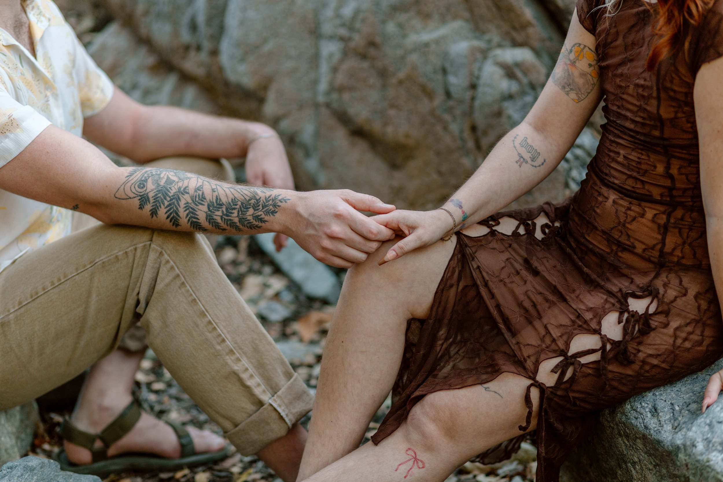 close up of couple’s hands holding each other during Madera Canyon engagement session 