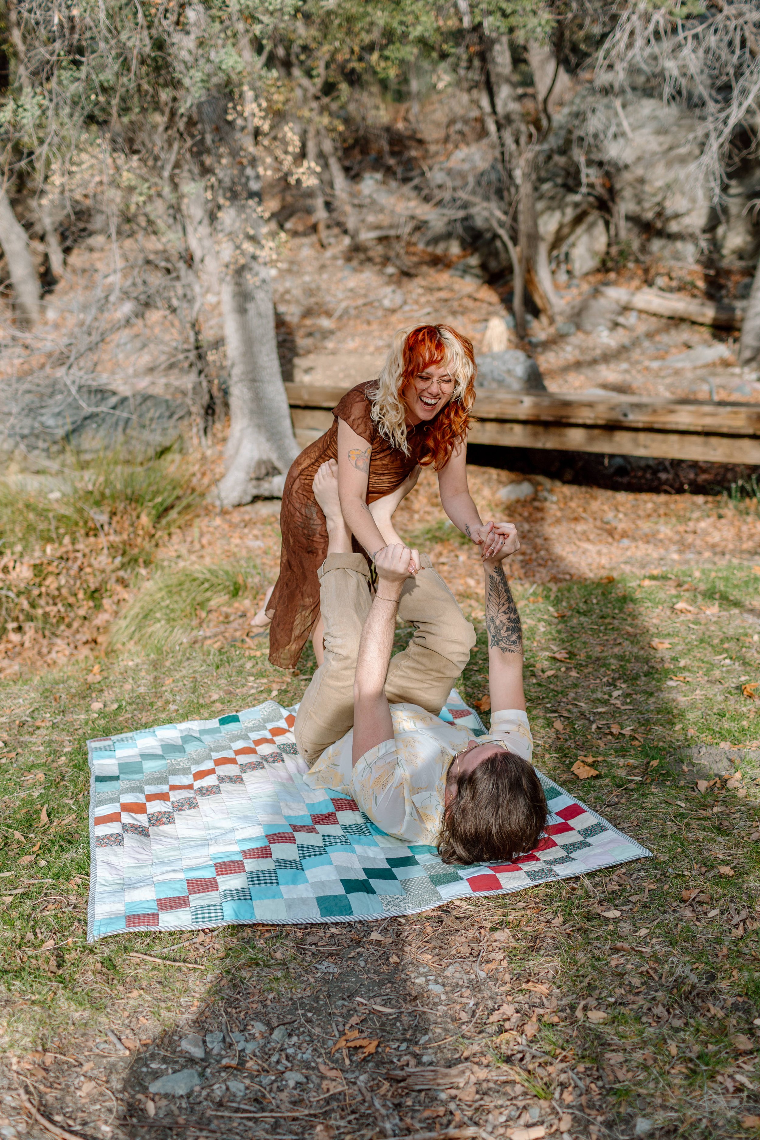  couple does a silly pose and laughs during Madera Canyon engagement session 