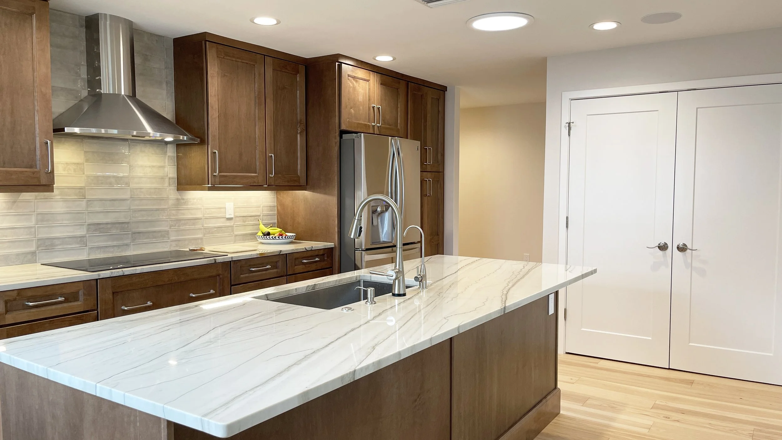 Warm Grey Kitchen Remodel by Lan Interior Design, LLC project photo