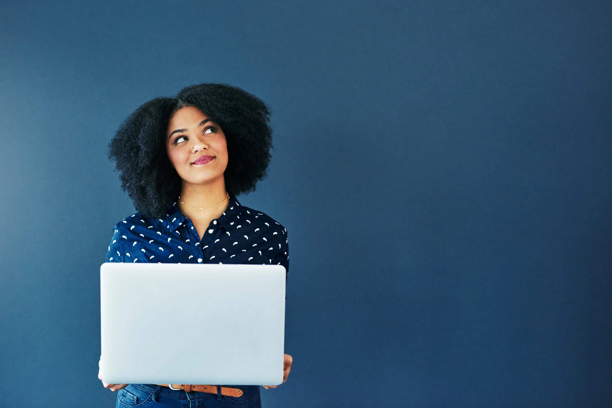 African-American singer pondering online voice lessons