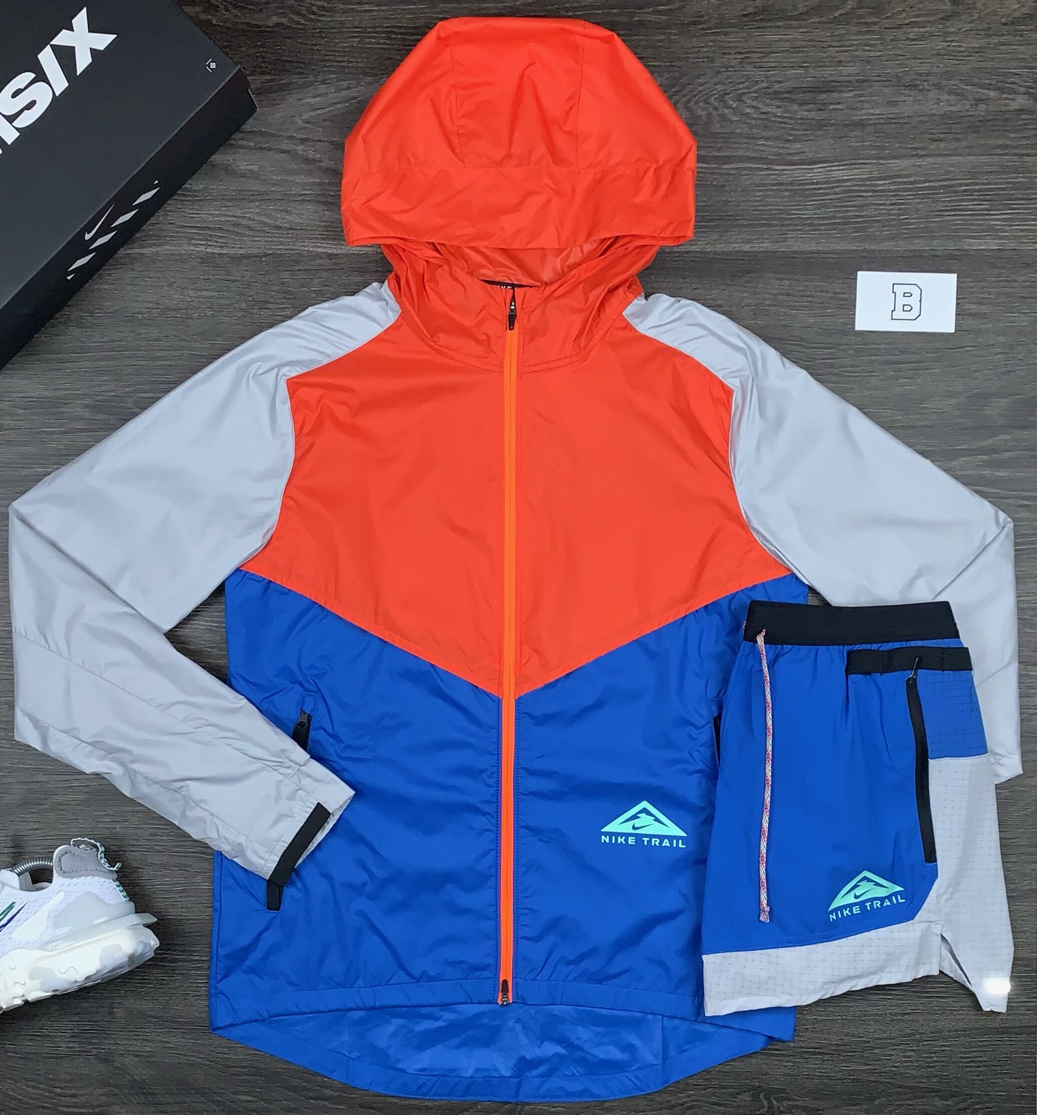 nike windrunner orange blue