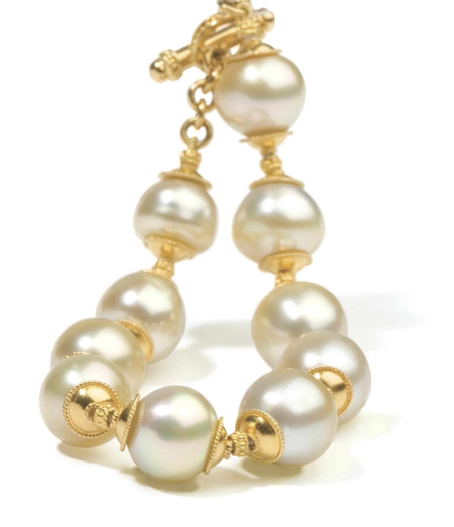 Gold pearl brace.jpg