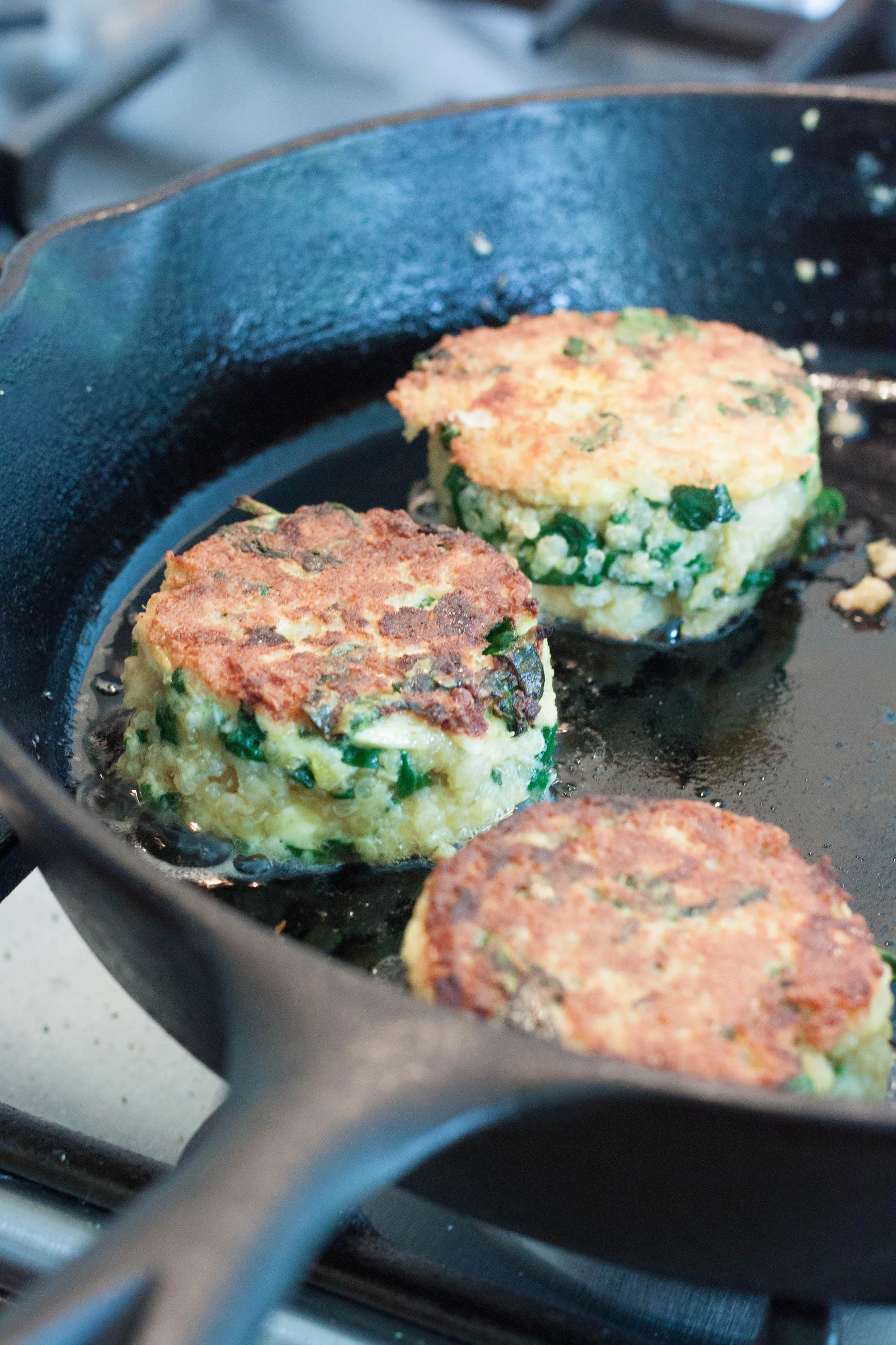 Spinach-Feta-Quinoa-Cakes-frying-in-pan.jpg
