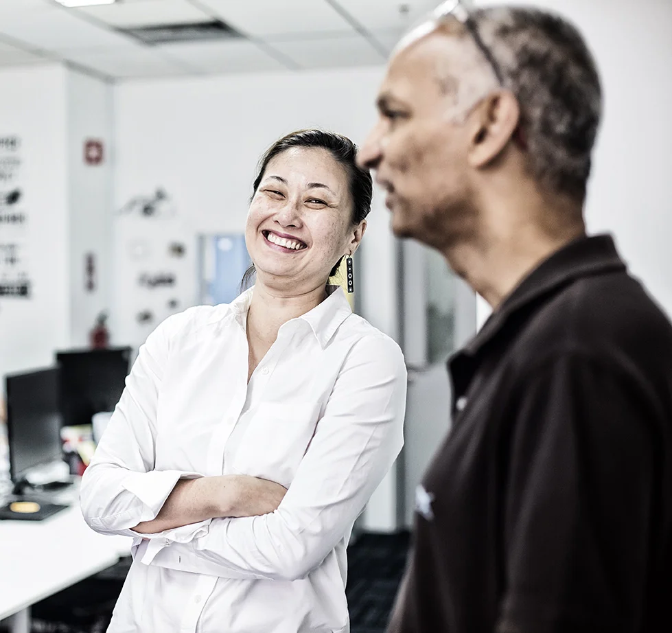 Laughter of the boss while having conversation