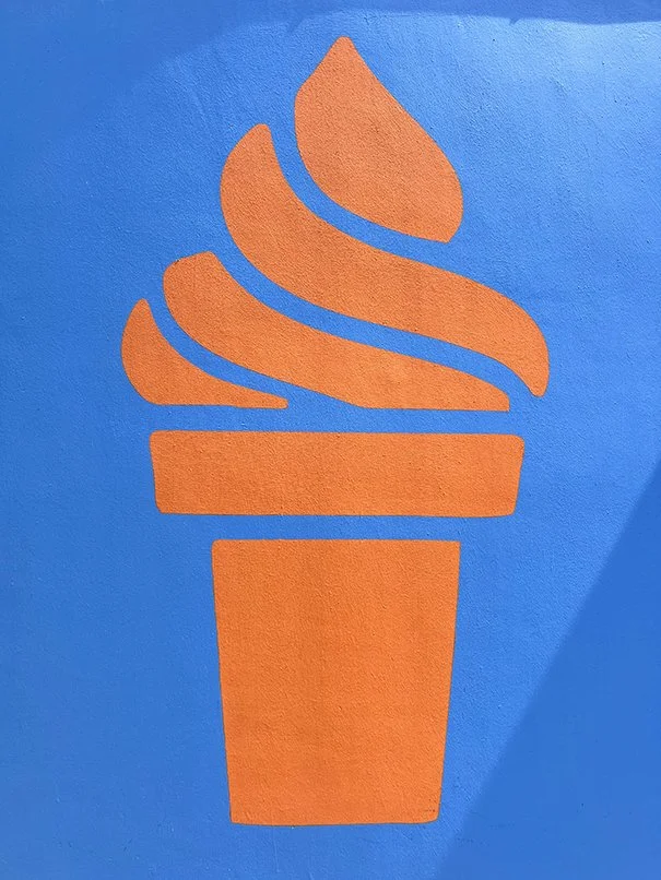 Ice-cream cone with good lighting on wall