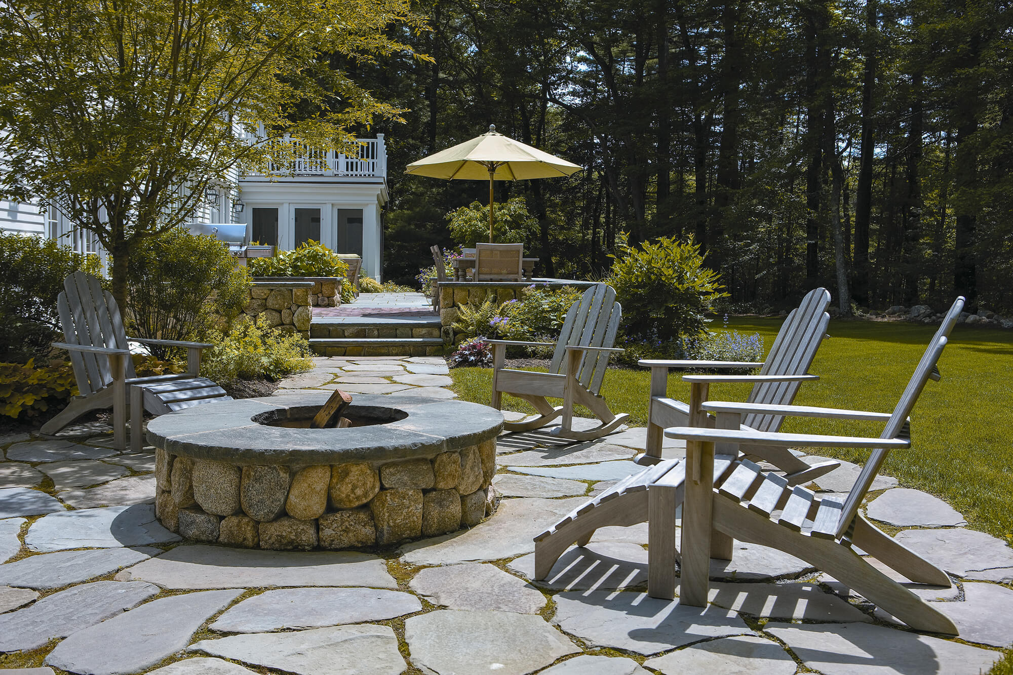 Fire Pit on Stone Patio with Seating