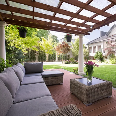Seating under Arbor in Backyard