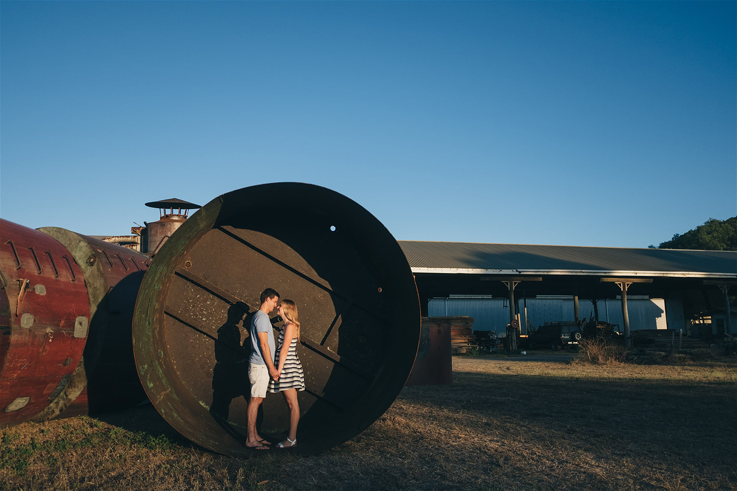 couple-holding-hands-inside-steel-drum.jpg