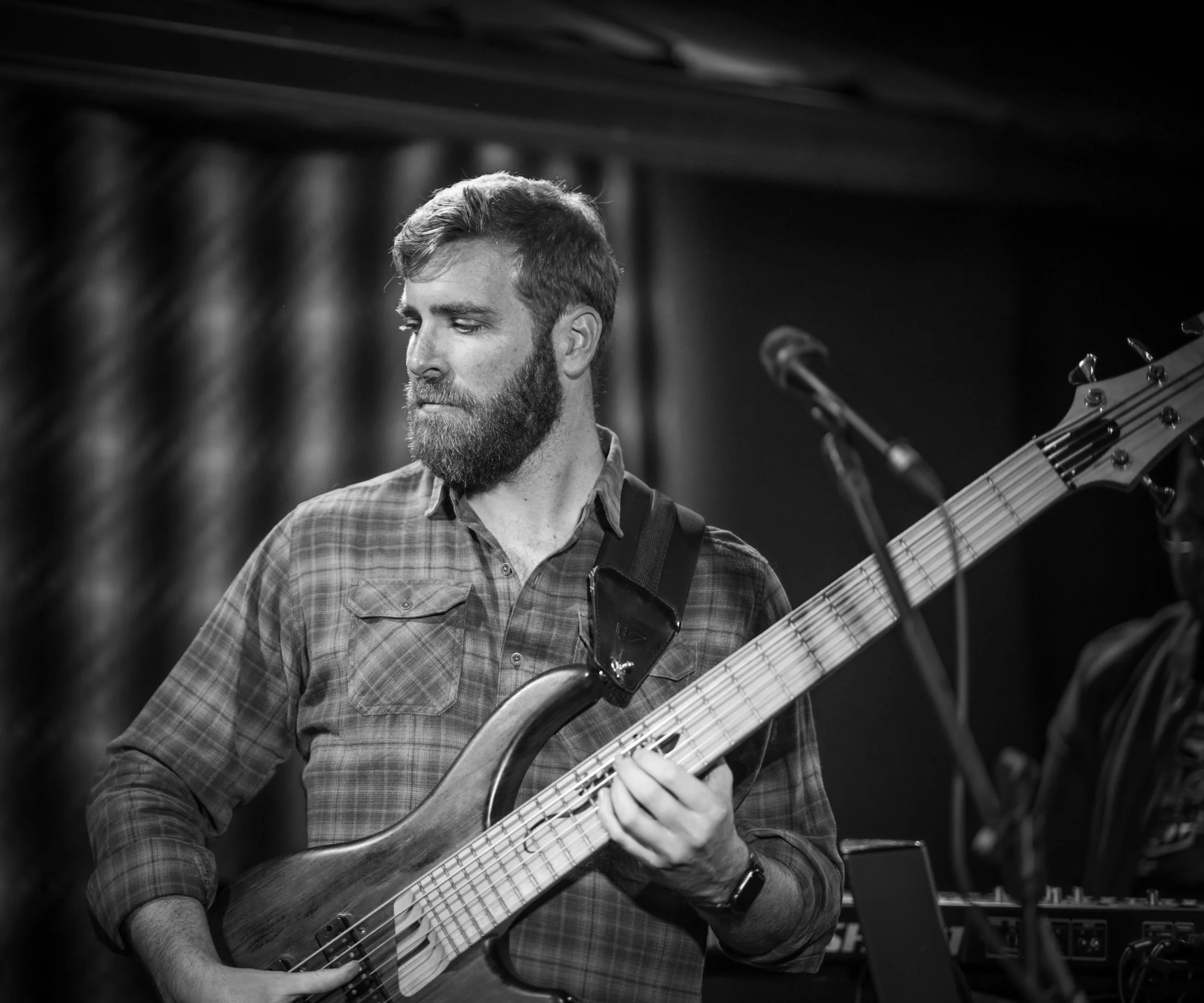 John Daniel Ray playing his custom 6 string bass