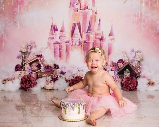 Even crying - cake smash photos are the perfect way to capture your little one turning ONE!  Thank you to Donna B's (owned by Great Dane Baking Co) for the perfect princess cake!