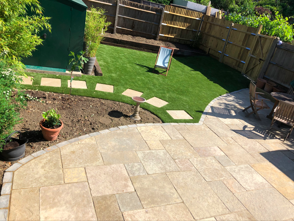 Limestone Curved Paving, Reclaimed sleepers, Cobbles, Artificial Turf 