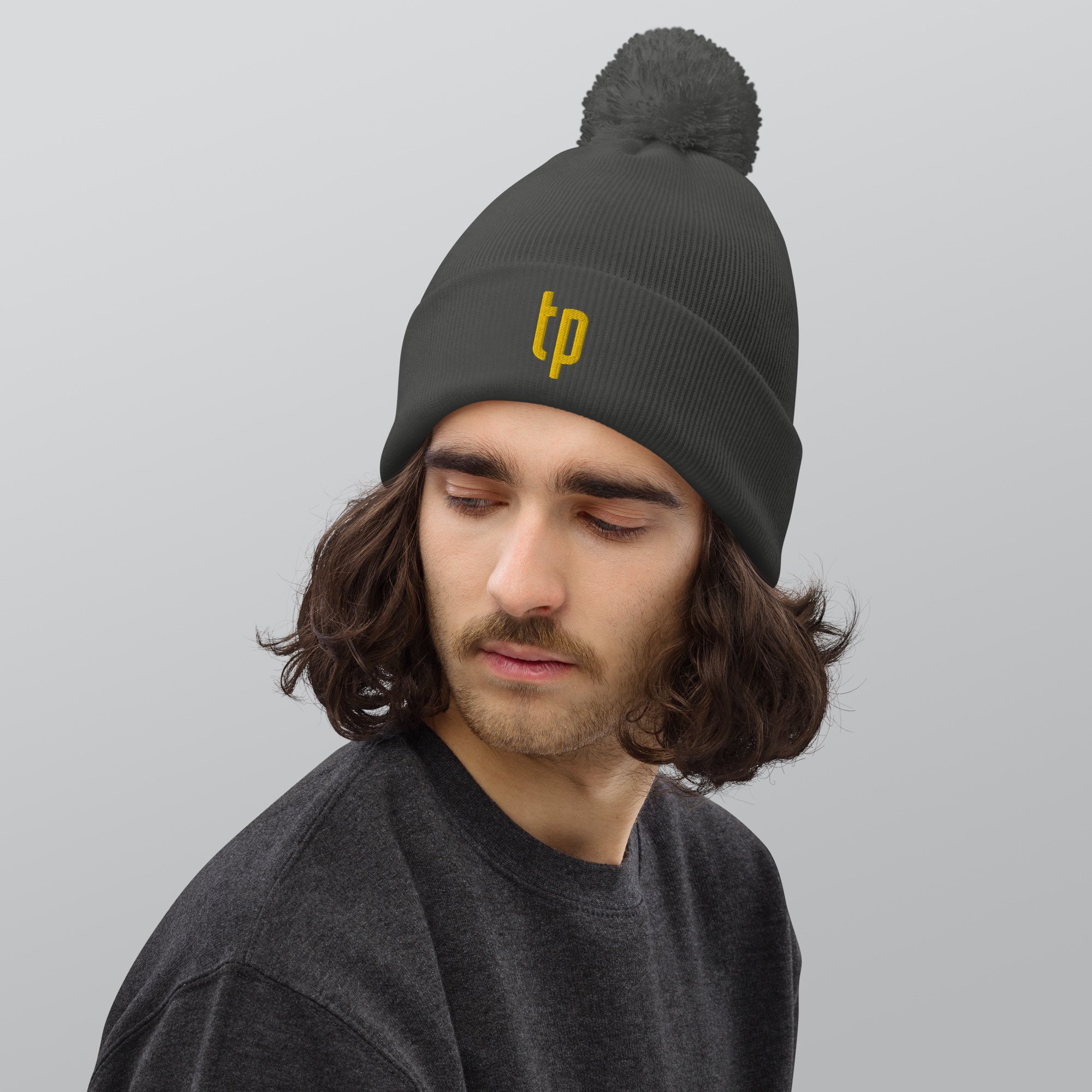 pom-pom-beanie-graphite-grey-front-6721646d6530c.jpg