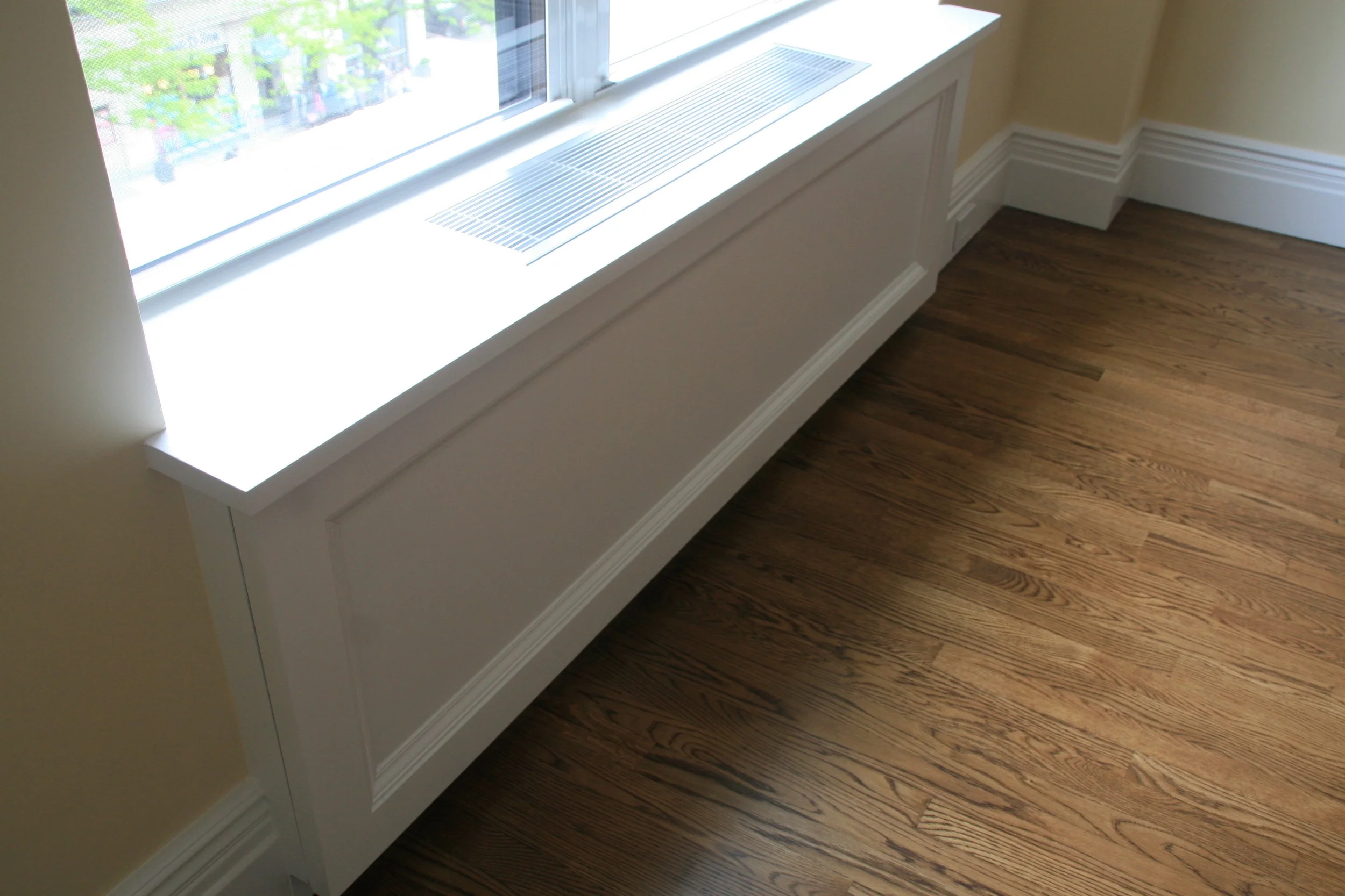 Radiator enclosures and grill design