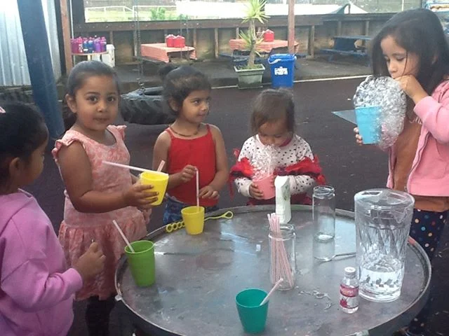 Blowing bubbles is something from our own childhood, and children of all ages love watching the science behind creating bubbles. In the past we’ve created huge bubbles down on our ‘green’ play area. But today, tamariki are creating small bubbles, lots of small bubbles. 
Blowing down a straw into a mixture of detergent and glycerin (glycerol) creates bubbles which stick together and last longer. 
#gigglestepuke