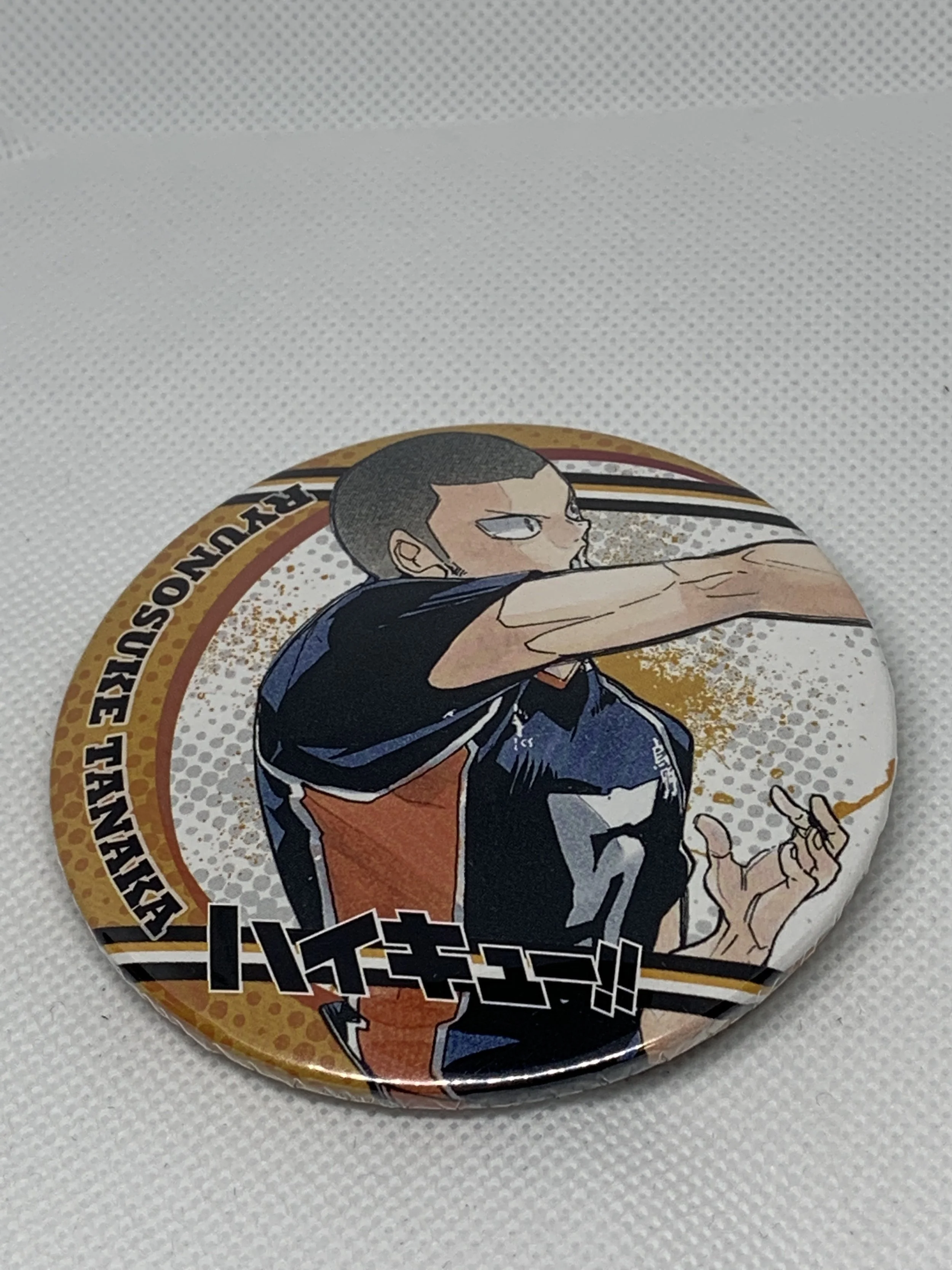 Tanaka Badge