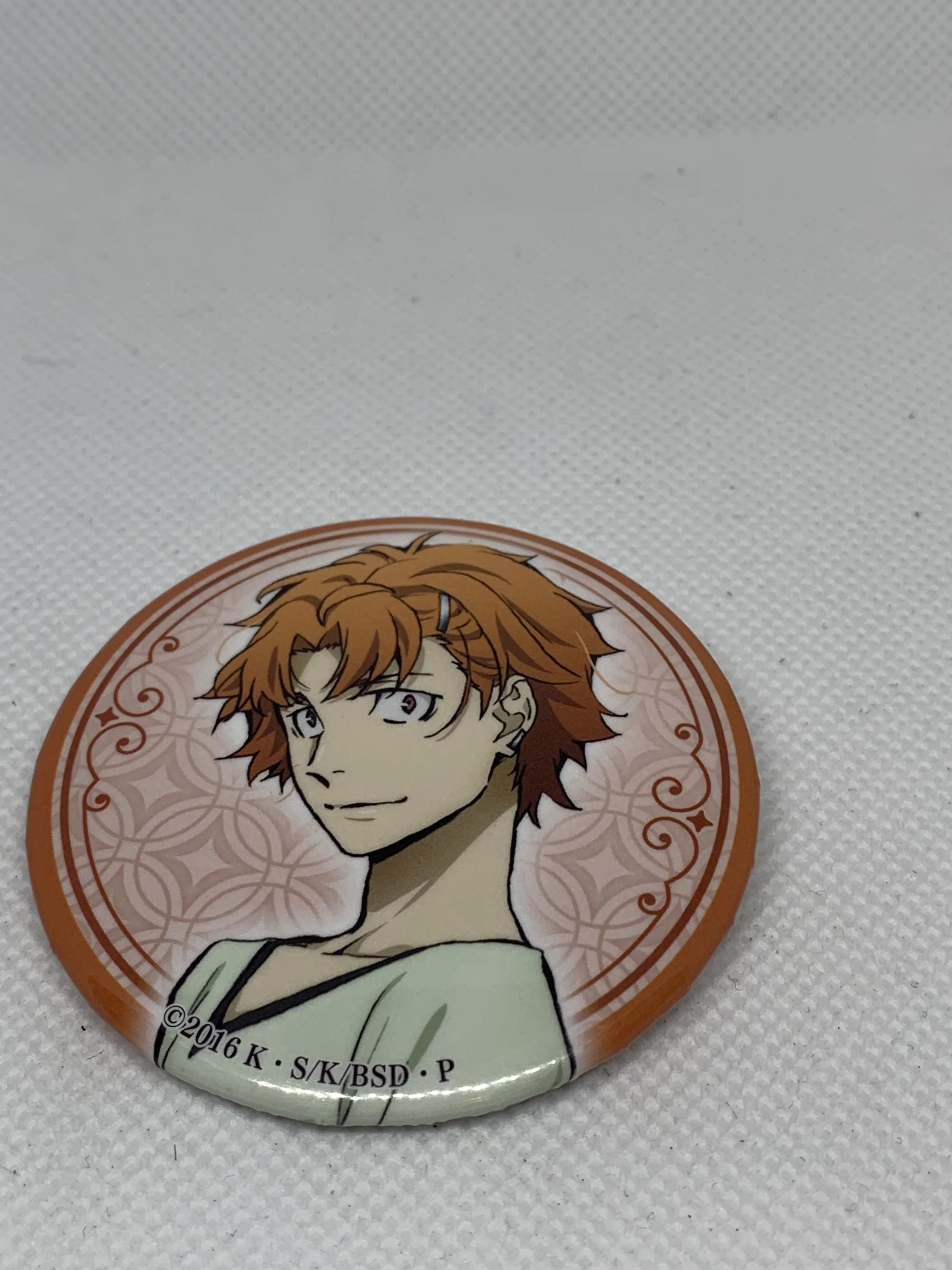 Tanizaki Badge