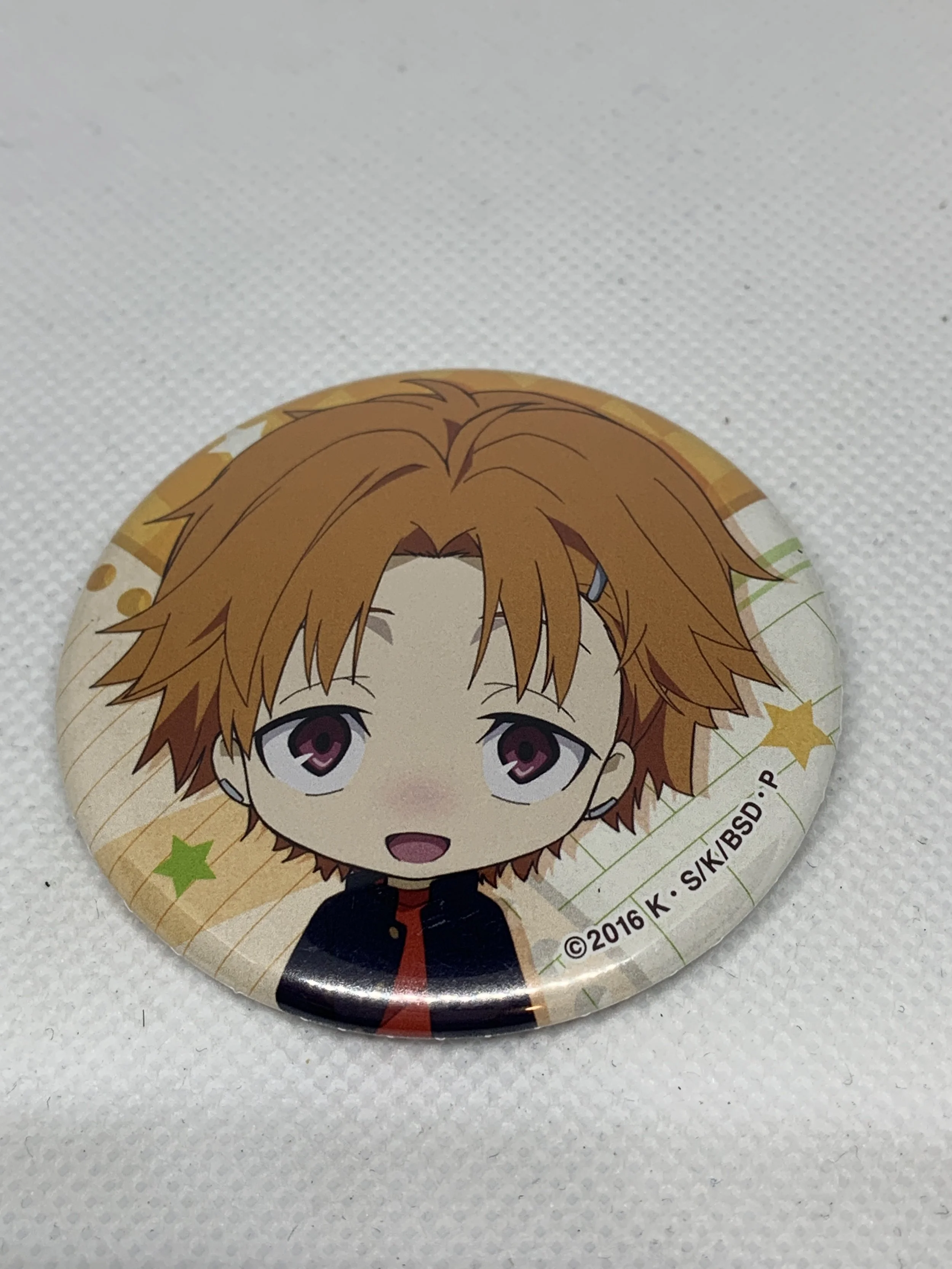 Tanizaki Badge