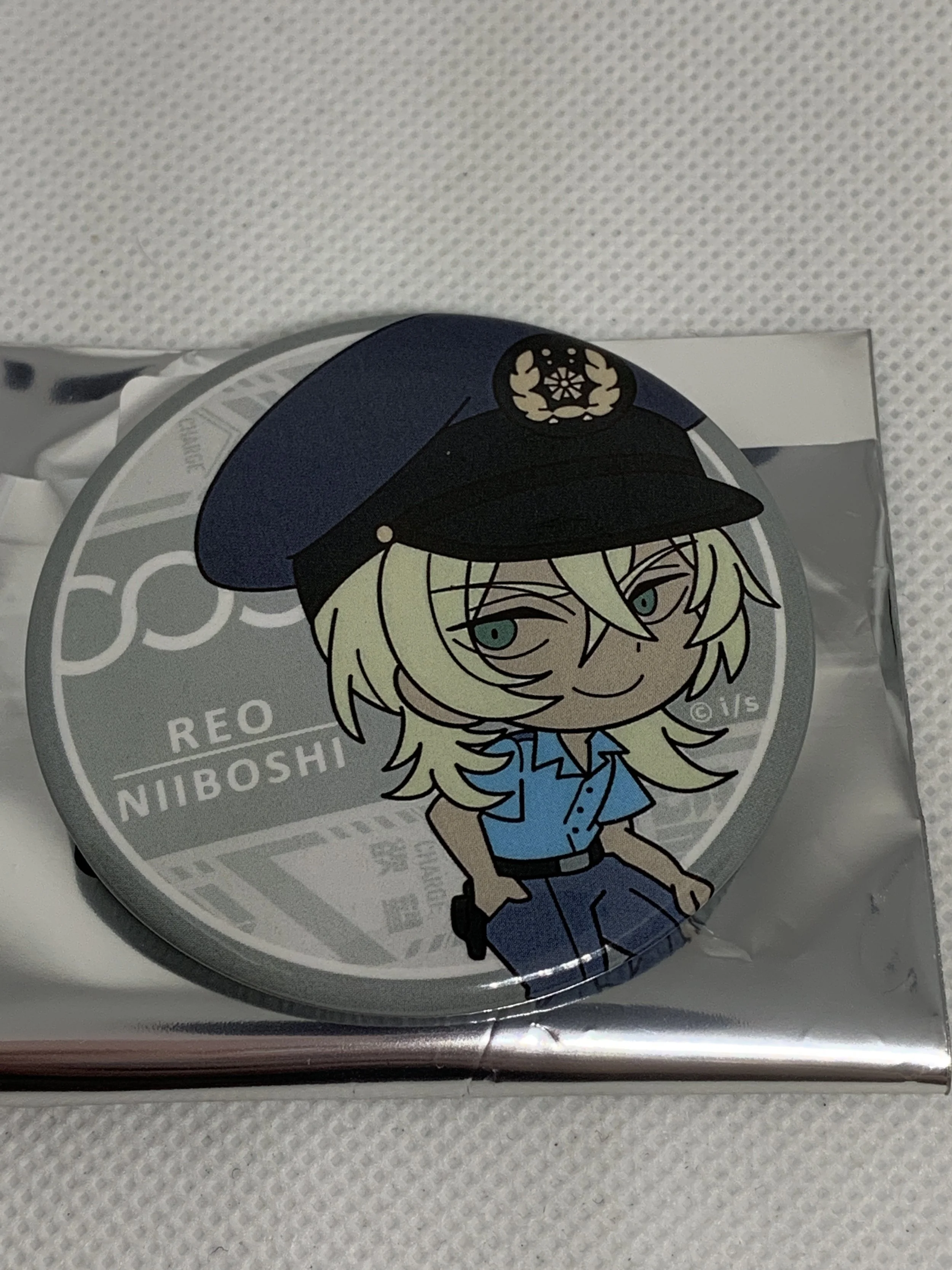 Reo Badge