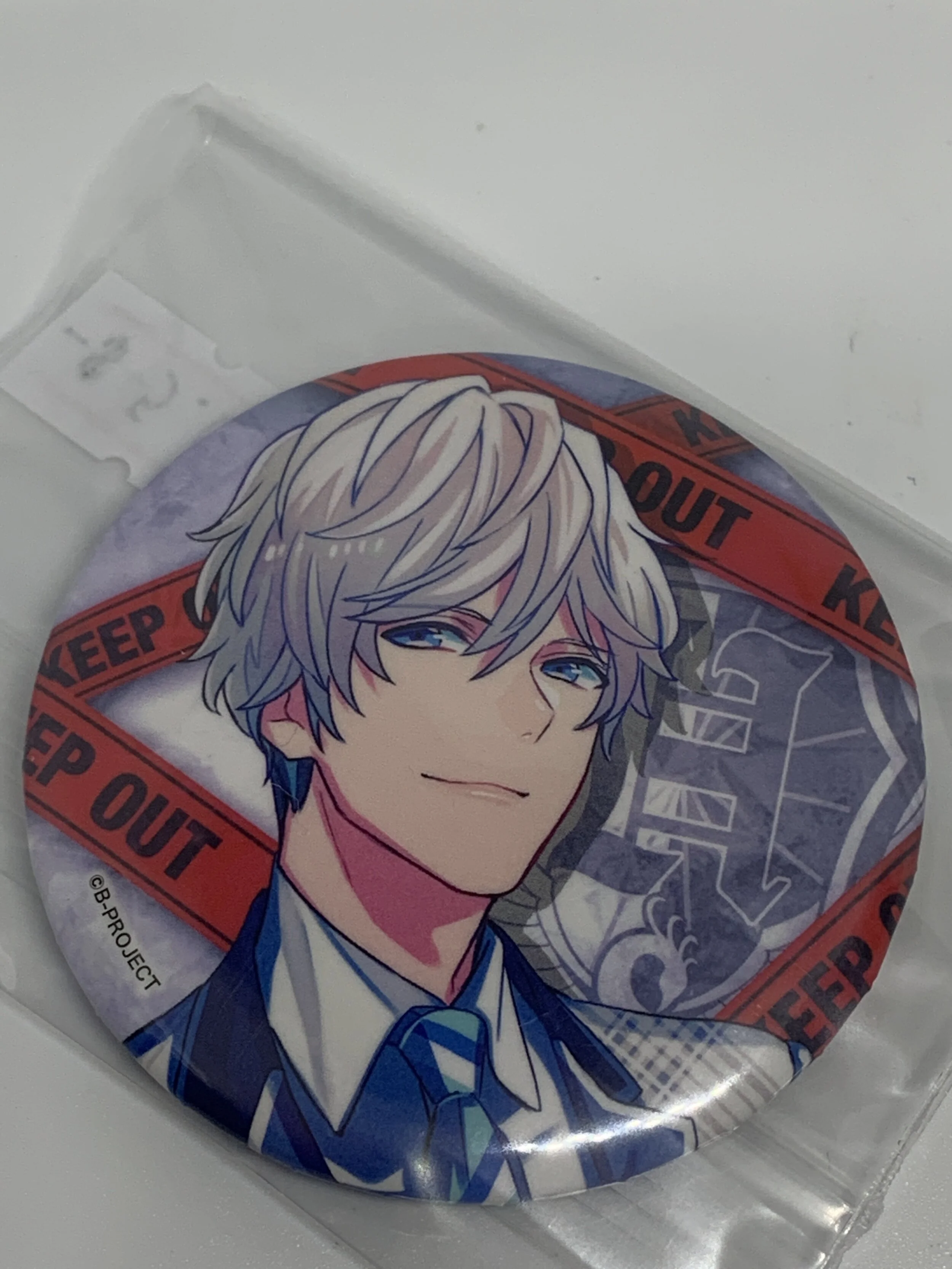 Tomohisa Kitakado  Badge