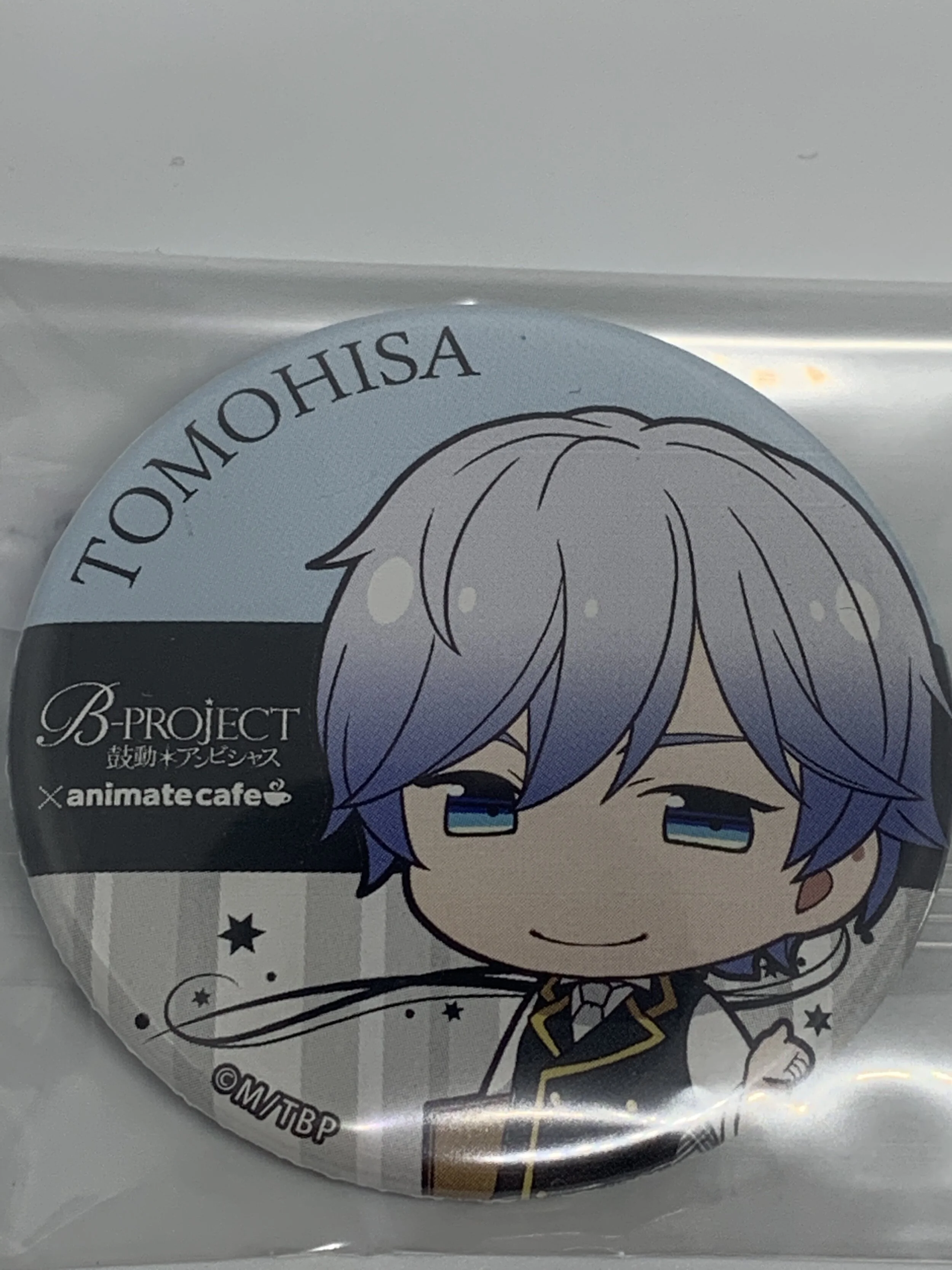 Tomohisa Kitakado Badge