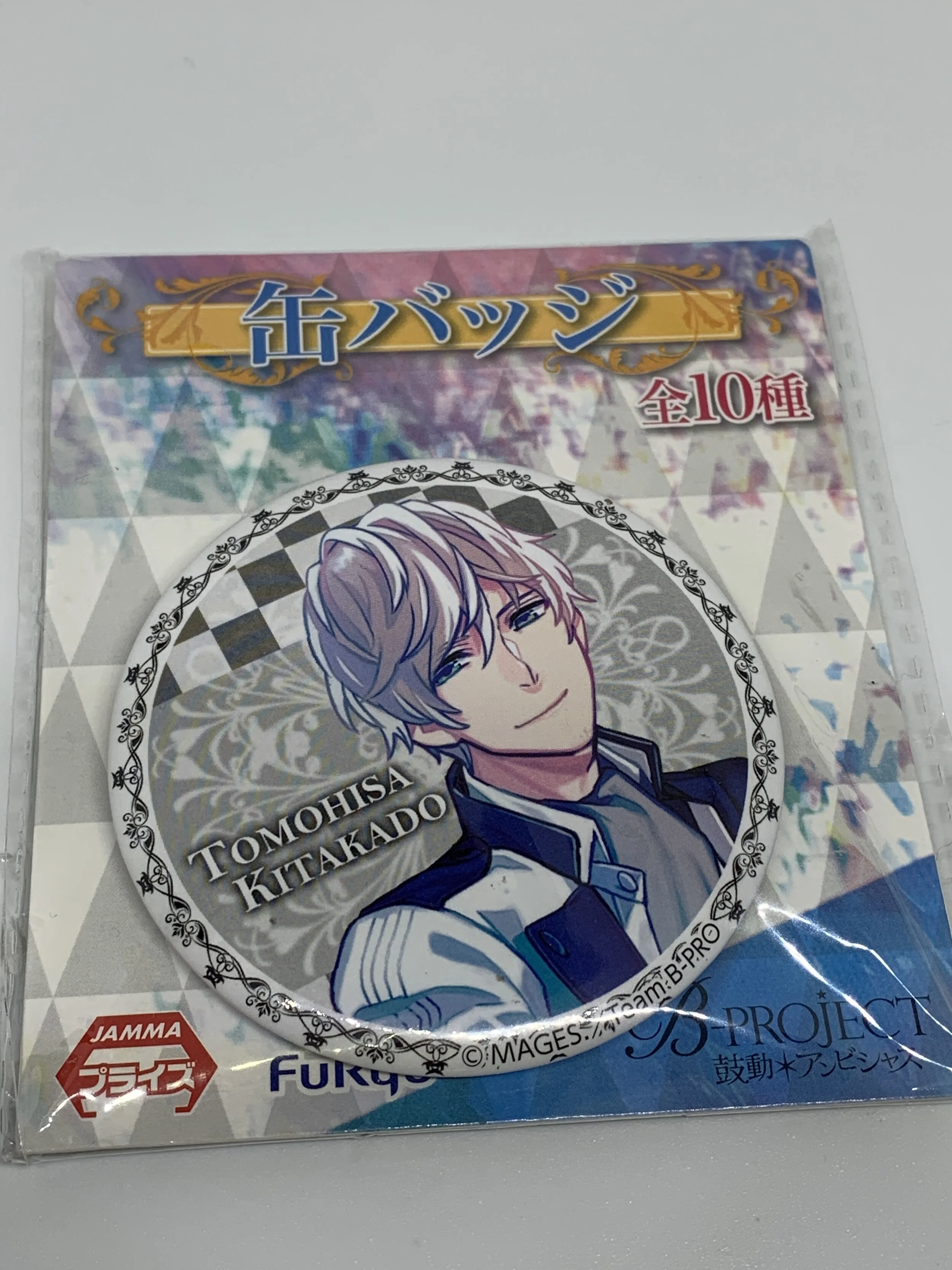 Tomohisa Kitakado Badge