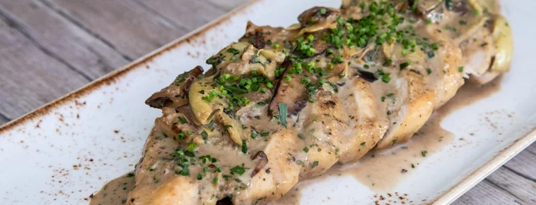 Pan-Seared Chicken With Creamy Portobellos And Artichokes