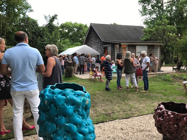 The opening spilled out to the sculpture garden. Ceramic vessels by Donna Green.