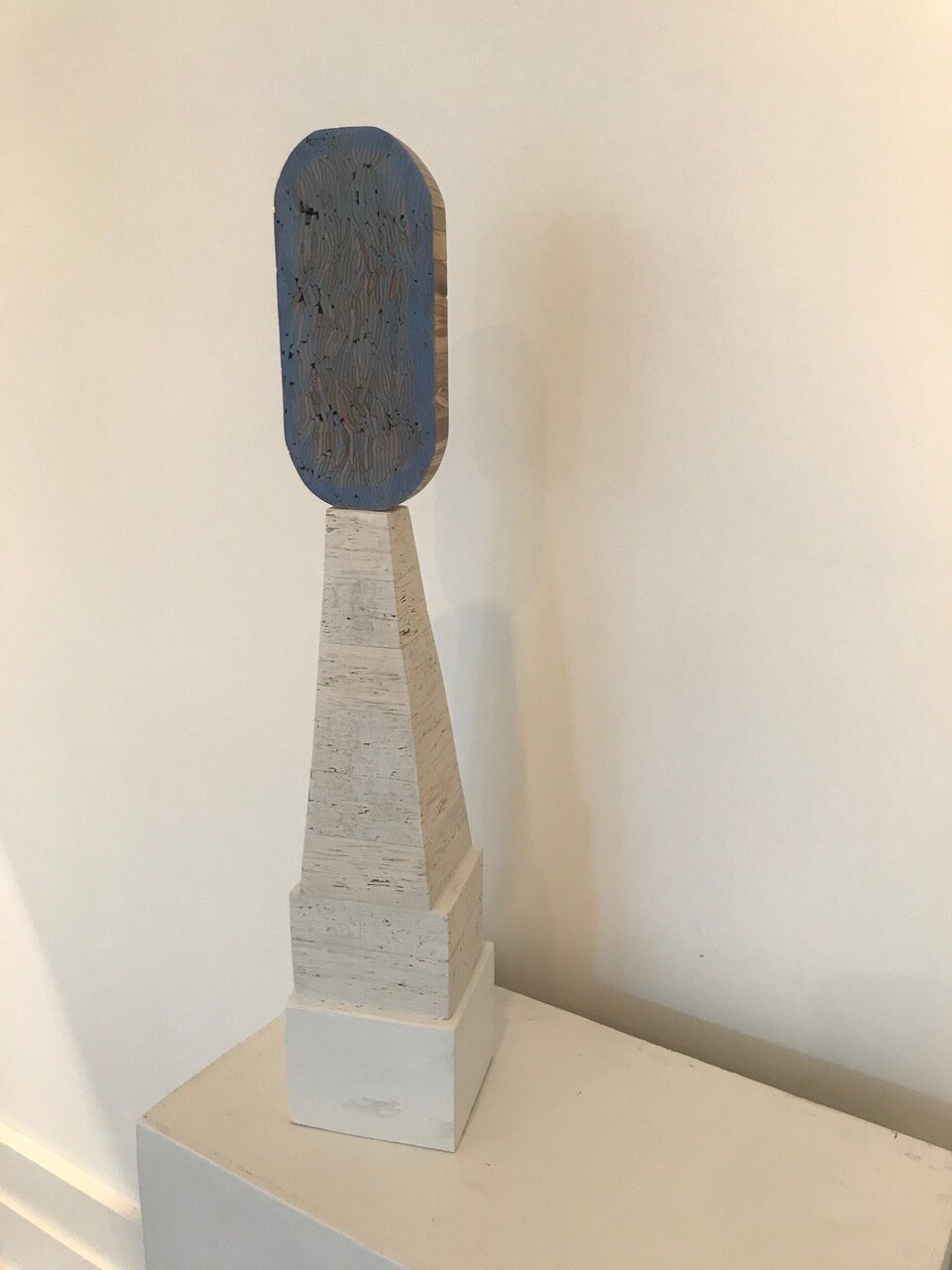 Beacon with Grey by Aurelio Torres, 2020, mixed media on found lumber, 4 x 4 x 19 in, $2,700