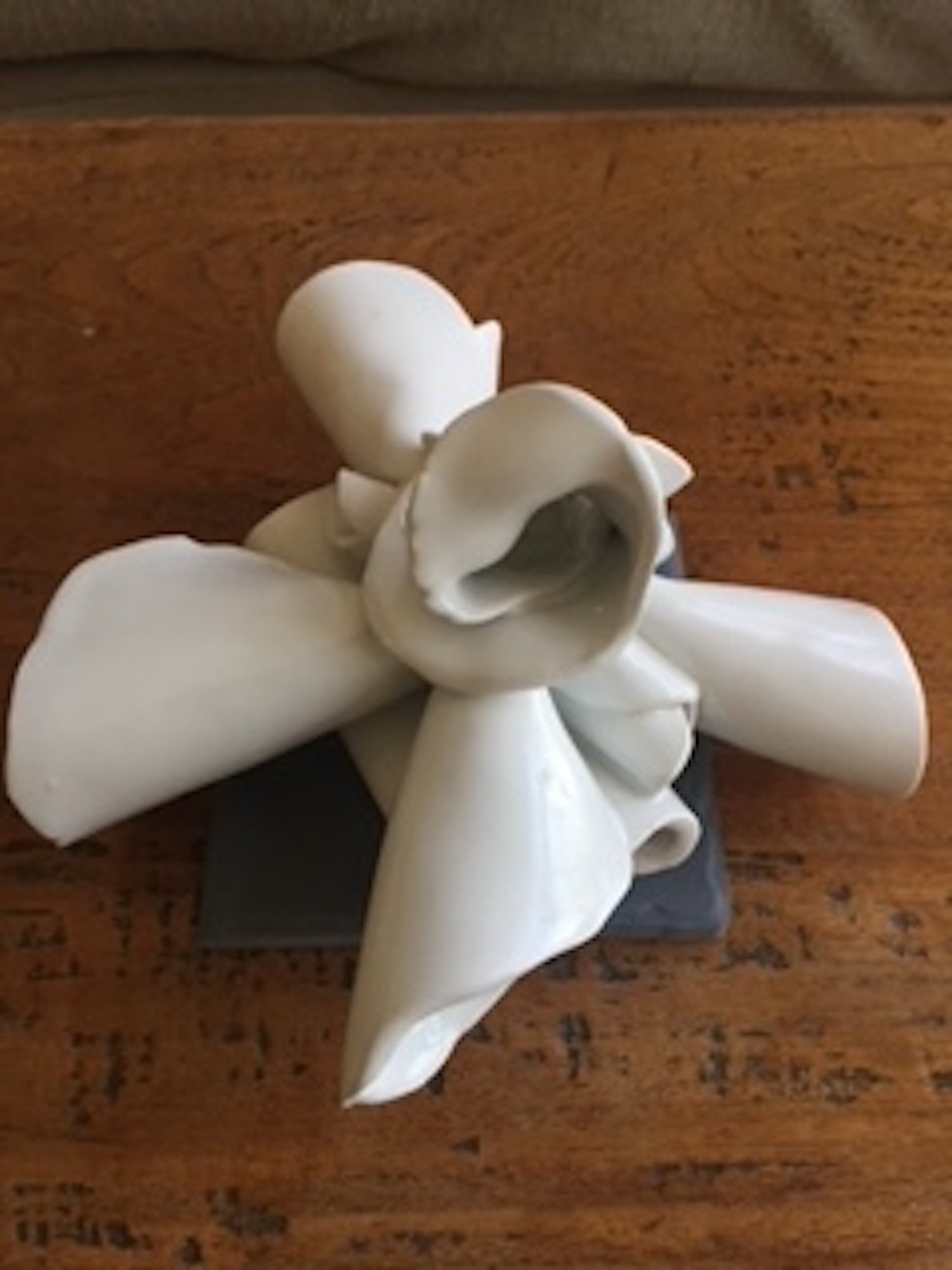 Lilium, 2021, white glazed ceramic, 5 x 8 x 8 in, $1,300