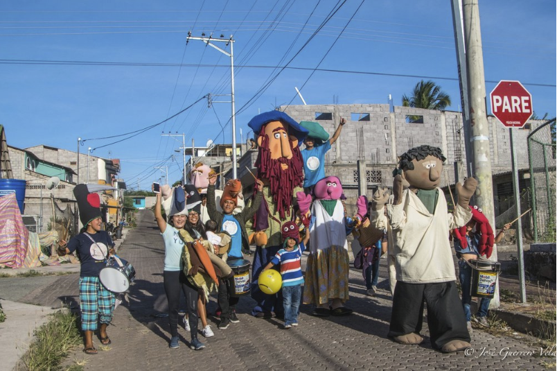 Figure 4. Club ALIVE and GECO launch a play using giant puppets in the streets of San Cristóbal. Photo: José Guerrero