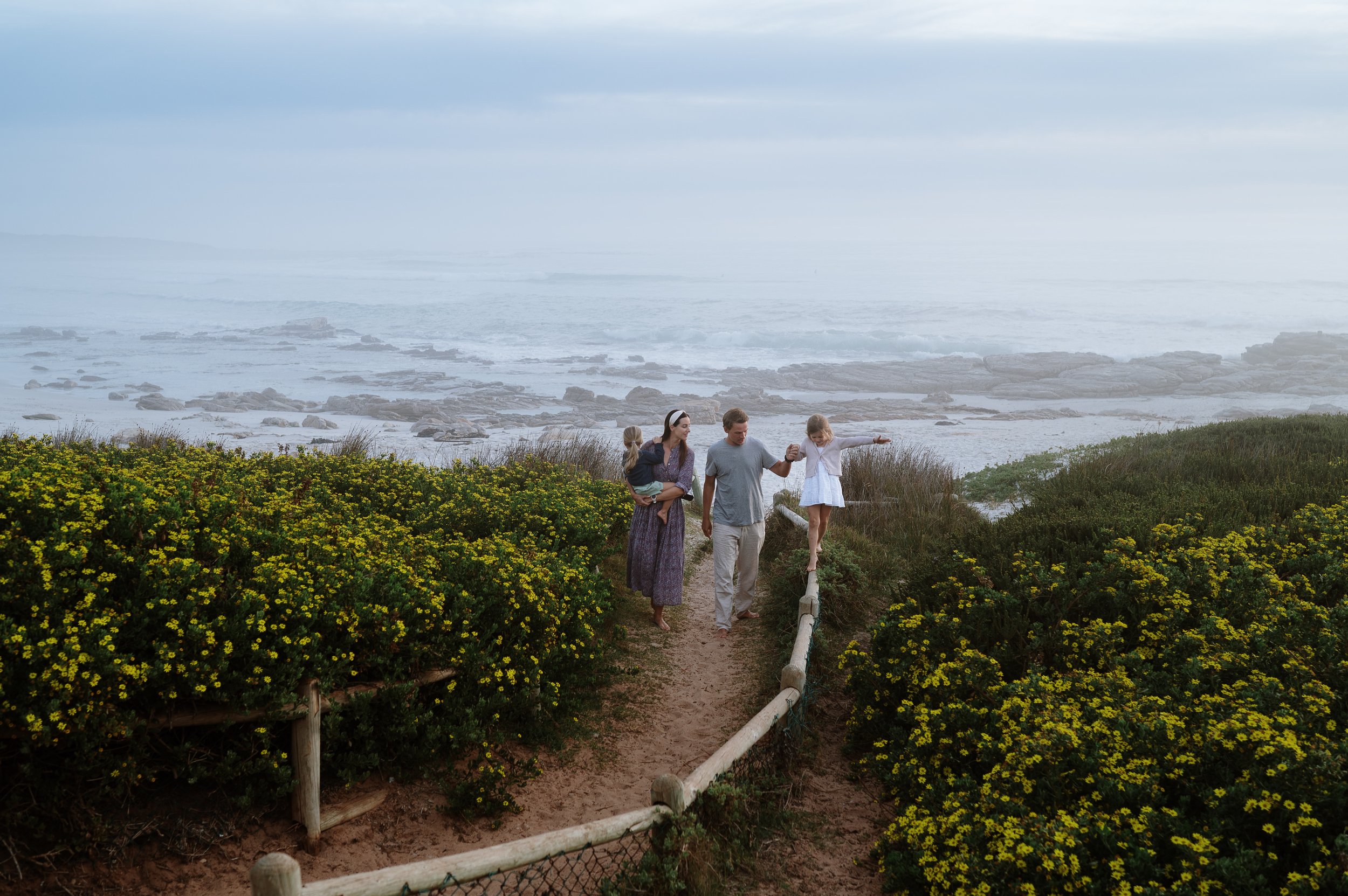 cape town family photoshoot with the yellow flowers in scarborough beach