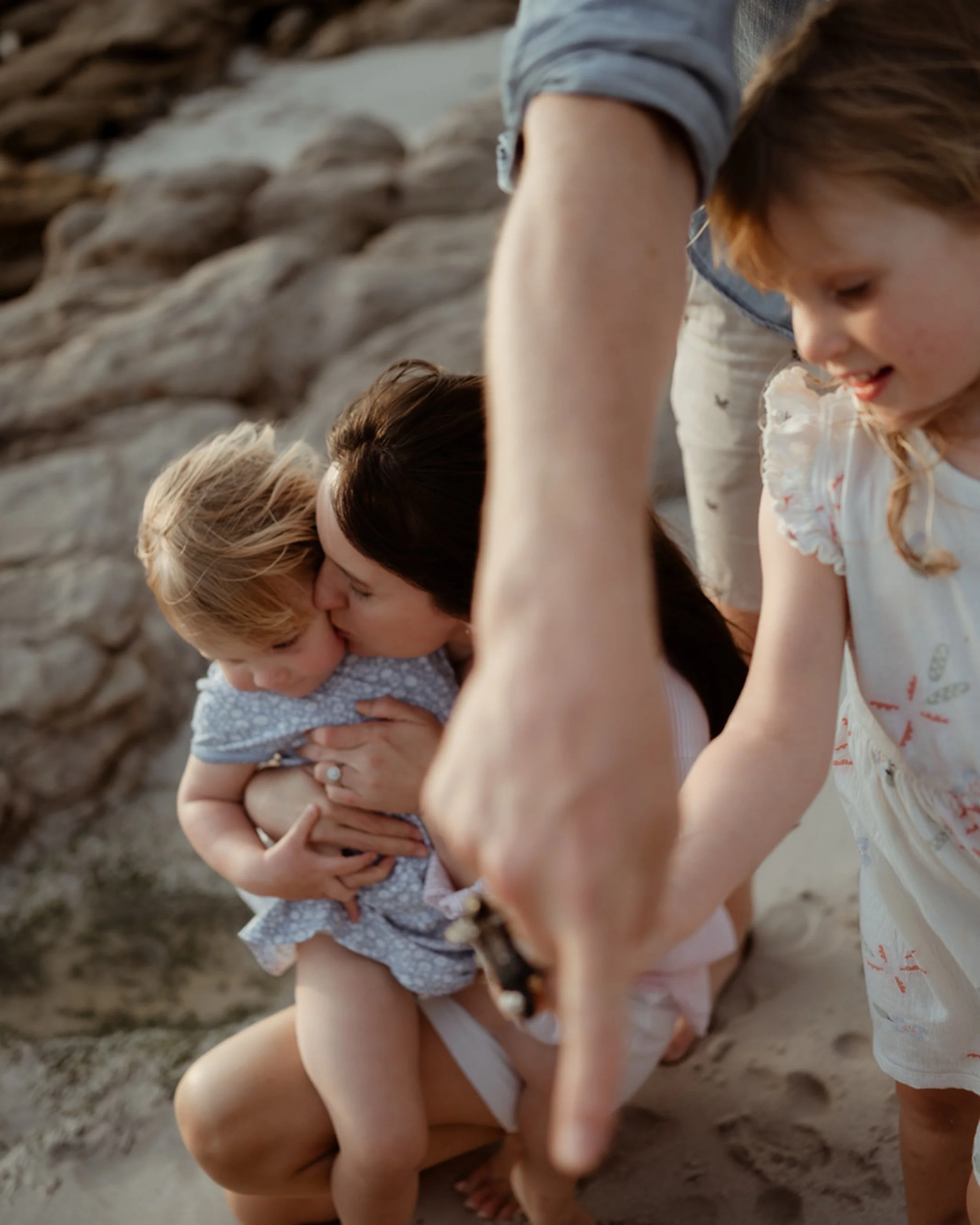 The kind of session where the parents never once stood back and watched. They were in it fully, joyfully, completely. Same energy, same wild hair, same bare feet in the sand. This is what it looks like when a family just plays.