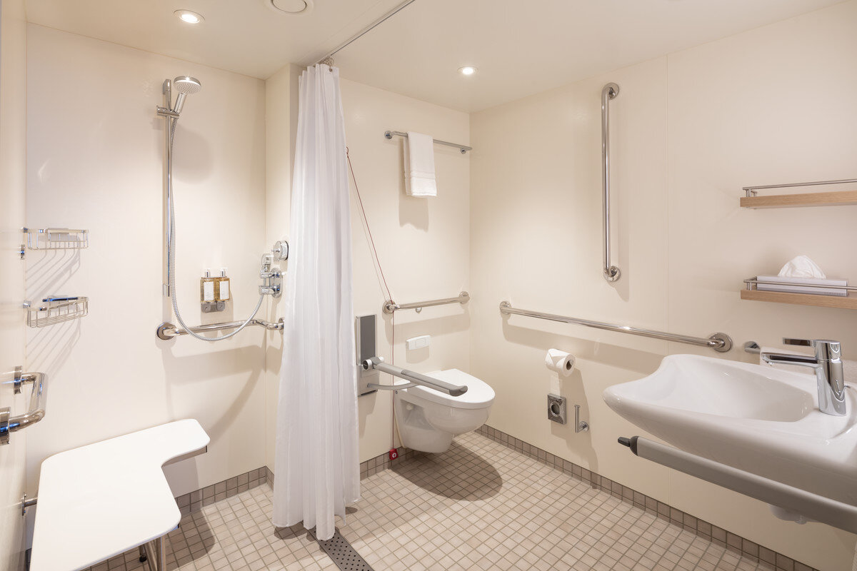 iona cruise ship deluxe balcony cabin Iona Accessible Cabin Bathroom Image: P&O’ Cruises