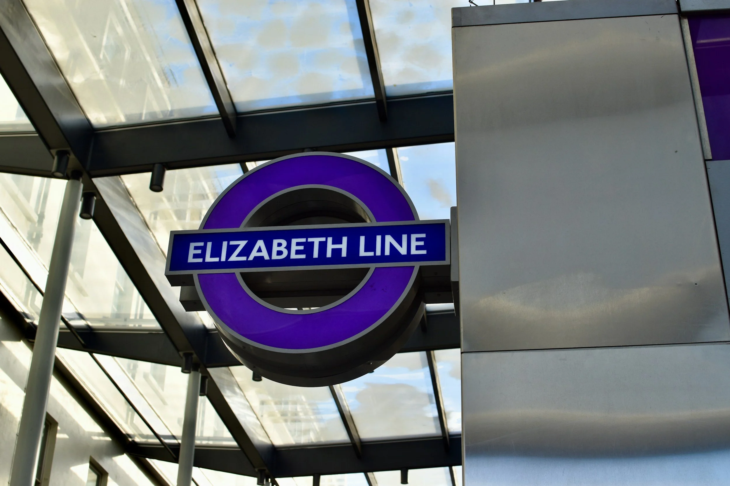 Elizabeth Line Sign - best airport public transportation with luggage.