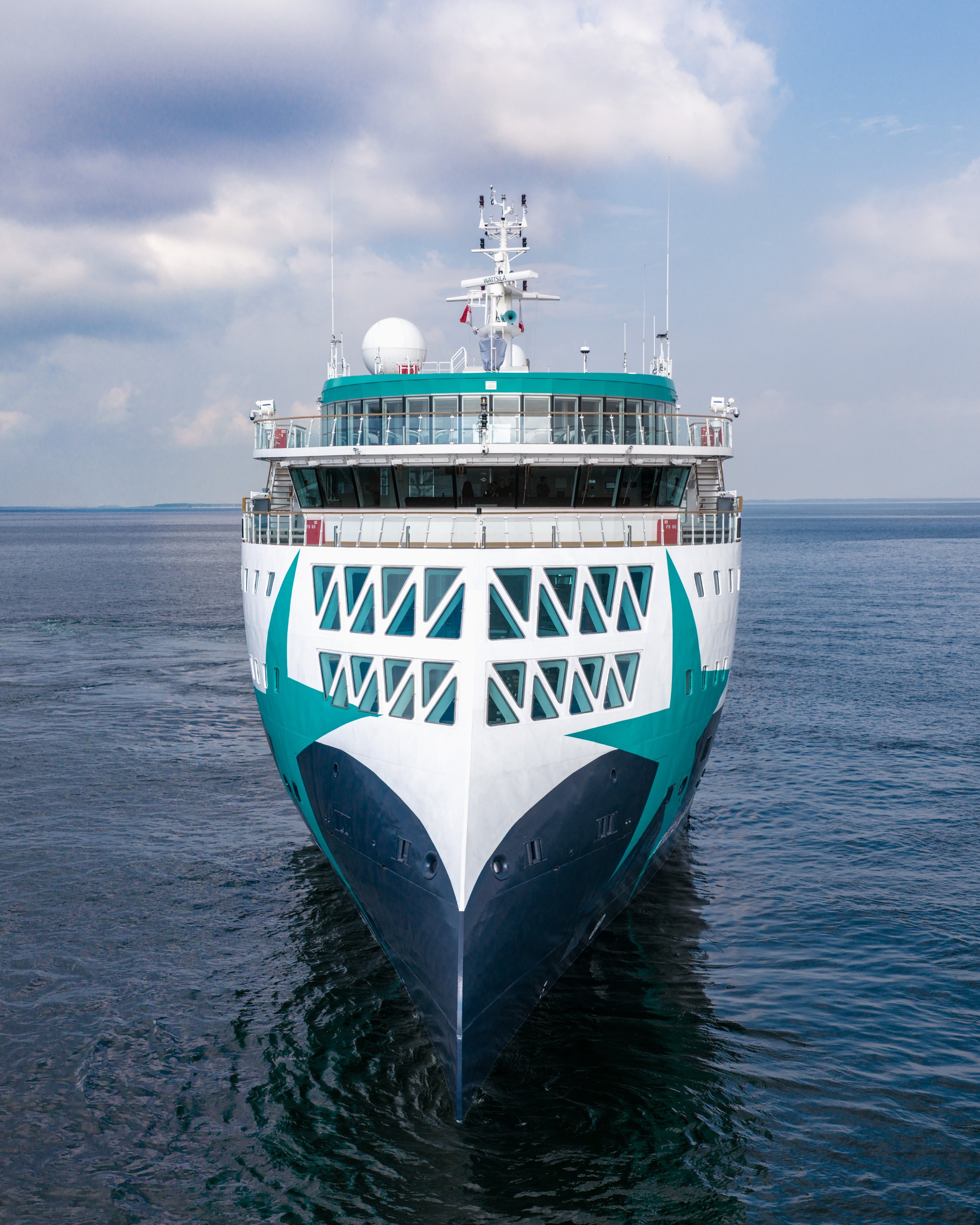 A new expedition ship launched in 2025 - Aurora Expeditions’ Douglas Mawson. Front exterior view of Douglas Mawson at sea.