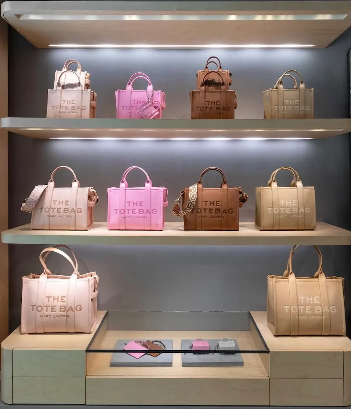 Standalone luxury designer handbag boutique display - Marc Jacobs Tote bags available on Virgin Voyages