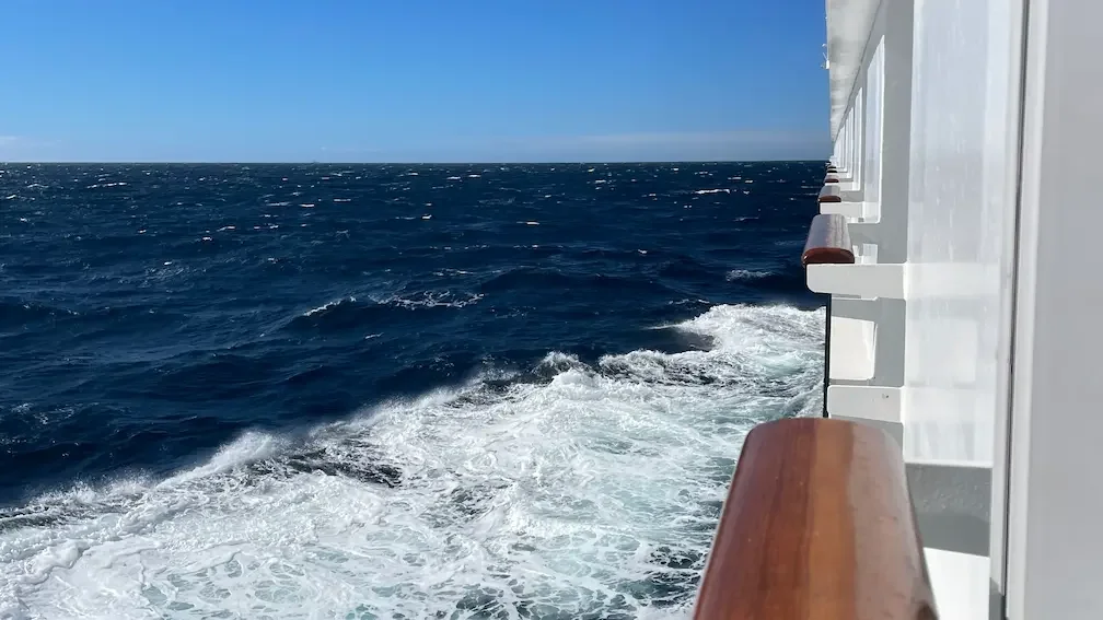 Watching the ocean from balcony on cruise ship