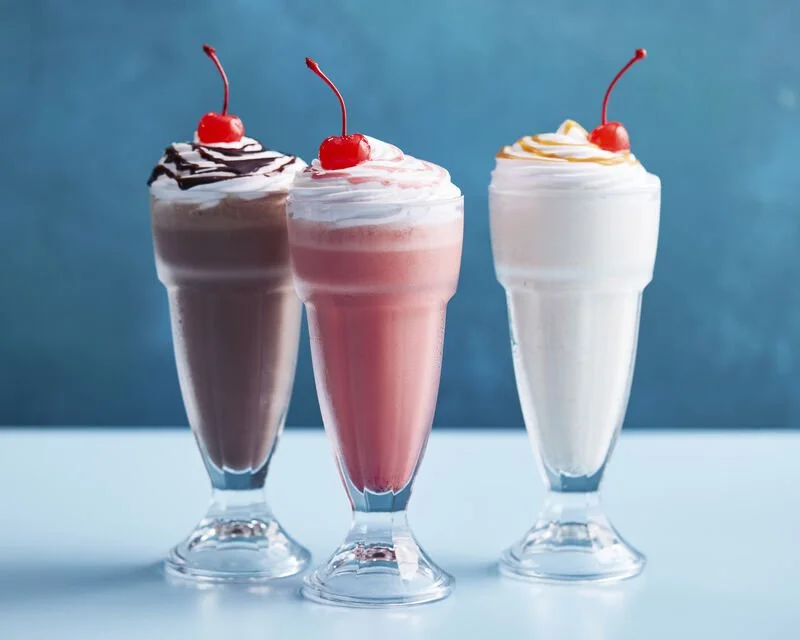 Three signature milkshakes (chocolate, strawberry and vanilla) topped with whipped cream each topped with a cherry.  Available in 6th Street Diner on P&O Cruises Arvia