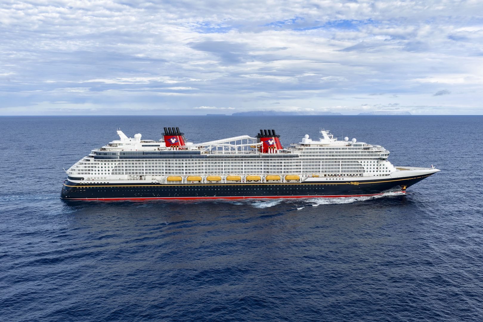 New ship Disney Destiny exterior shot sailing on ocean