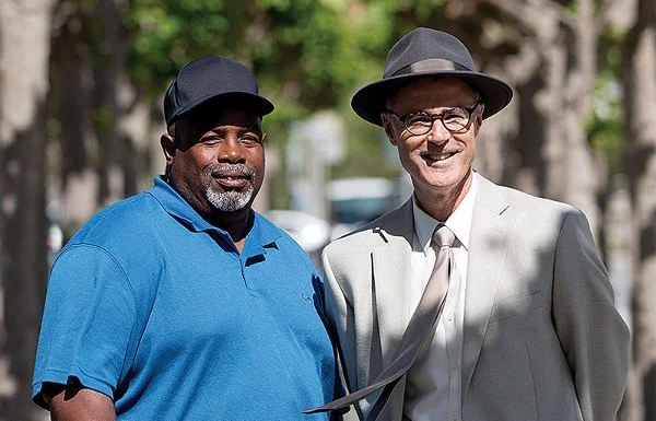 Byron Gill (left) and his attorney, Gregory P. Brock. (Jessica Christian/S.F. Examiner)
