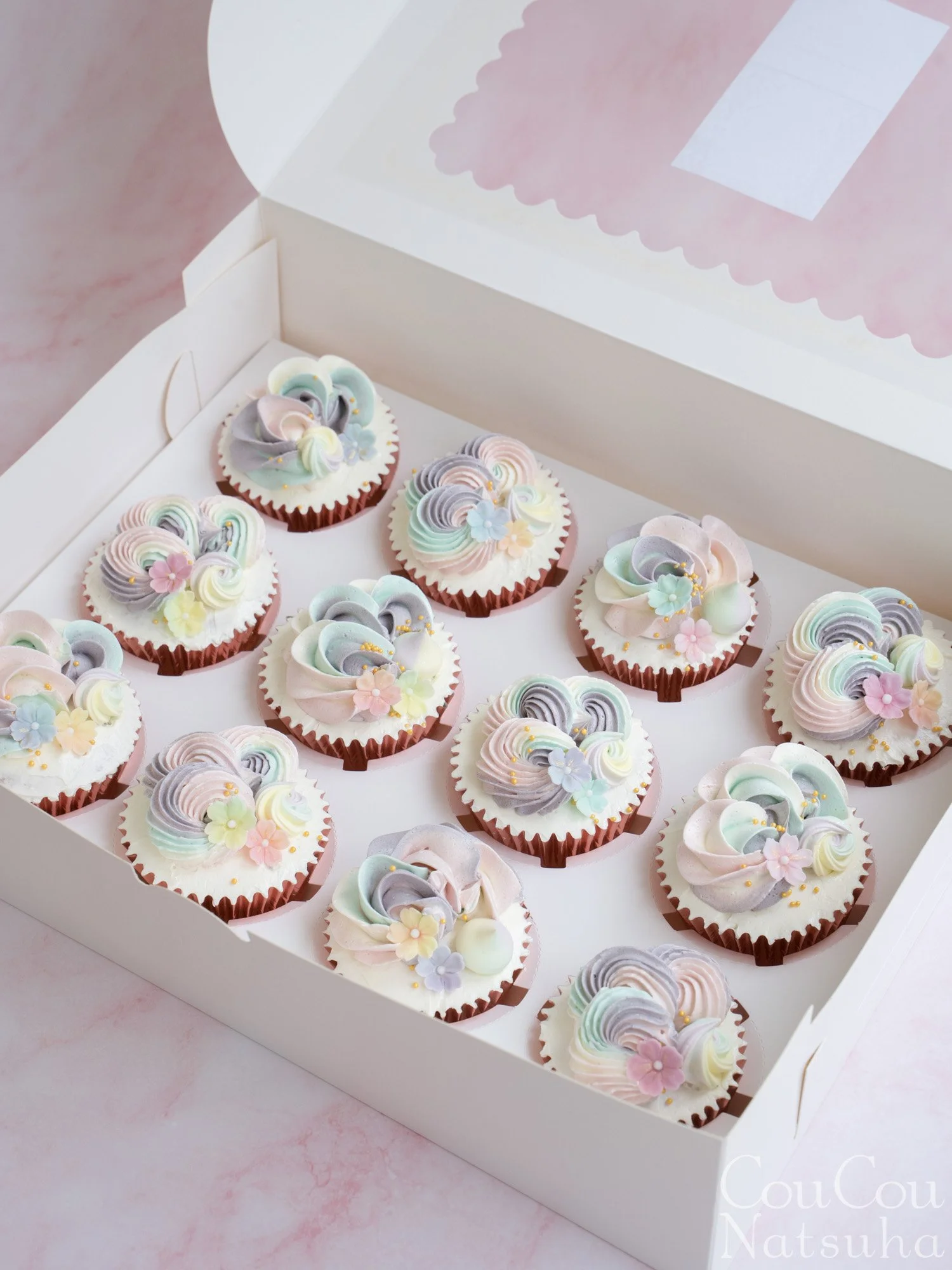 A Symphony in Pastel: Rainbow and Sakura Cupcakes