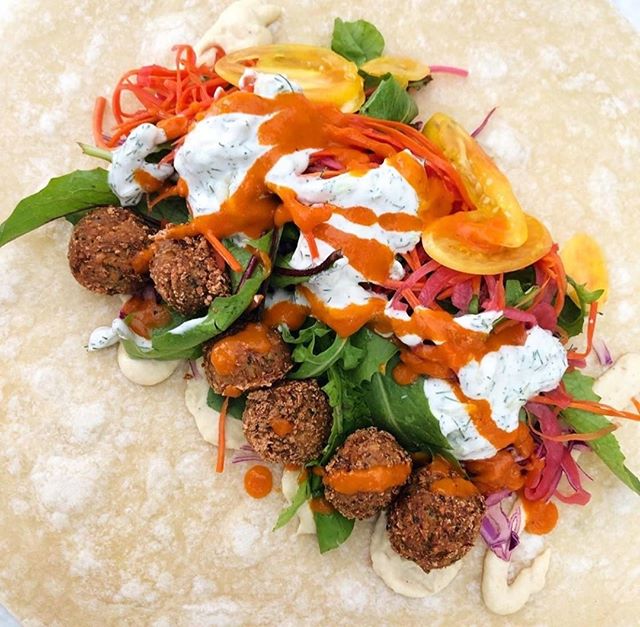 Is #FalafelFriday a thing? Cause it should be. @noraskitchenict in Wichita, KS wrappin' up the work week (GET IT! 🤪) 🥕⁠
.⁠
.⁠
#plantbased #plantpower #plantpowered #whatveganseat #veganfoodshare #veganfood #veganaf #vegandining #nom #veganoptions #